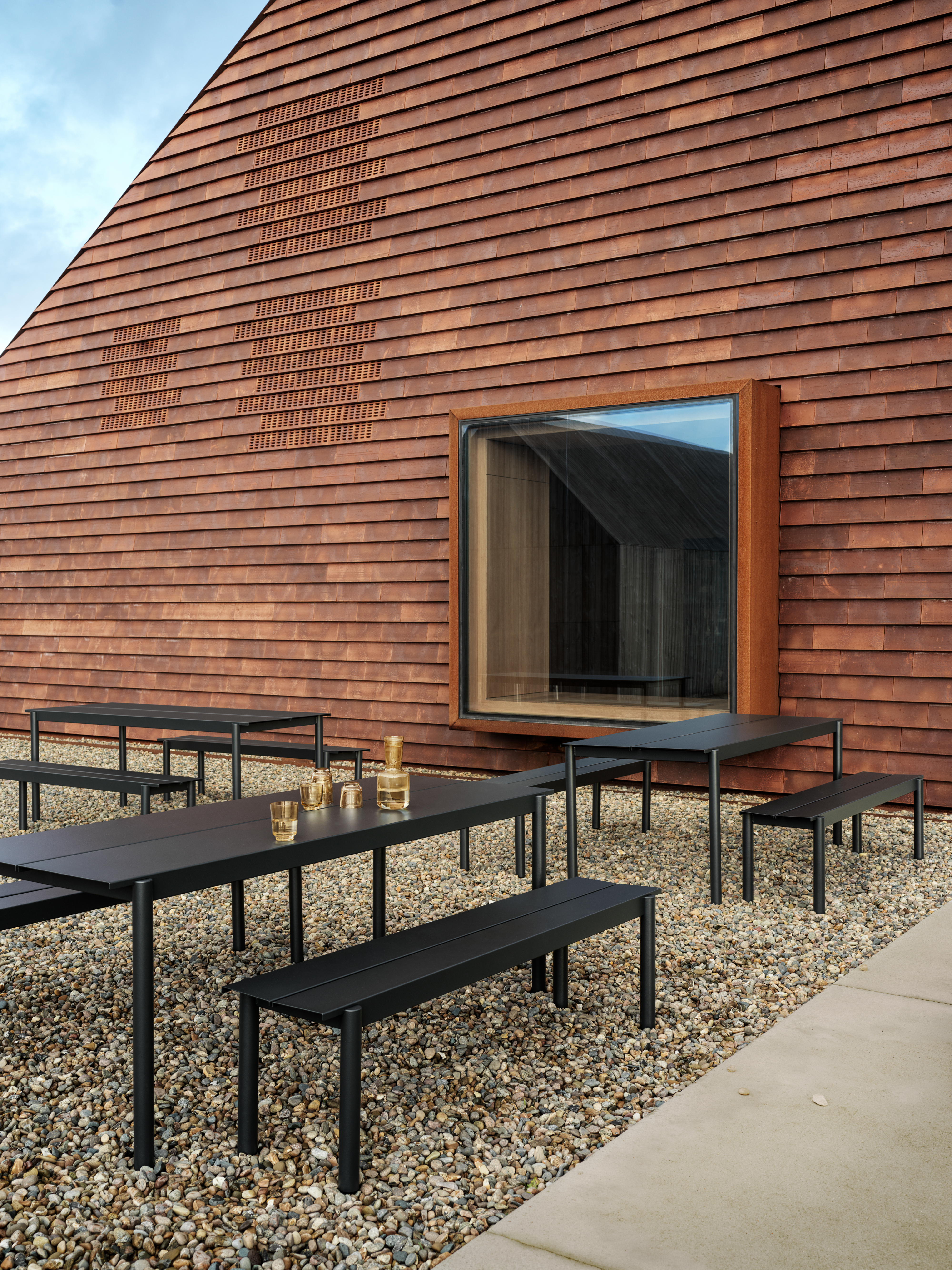 Linear Steel Table & Bench in Black - Raise Carafe & Glasses in Burnt Orange
