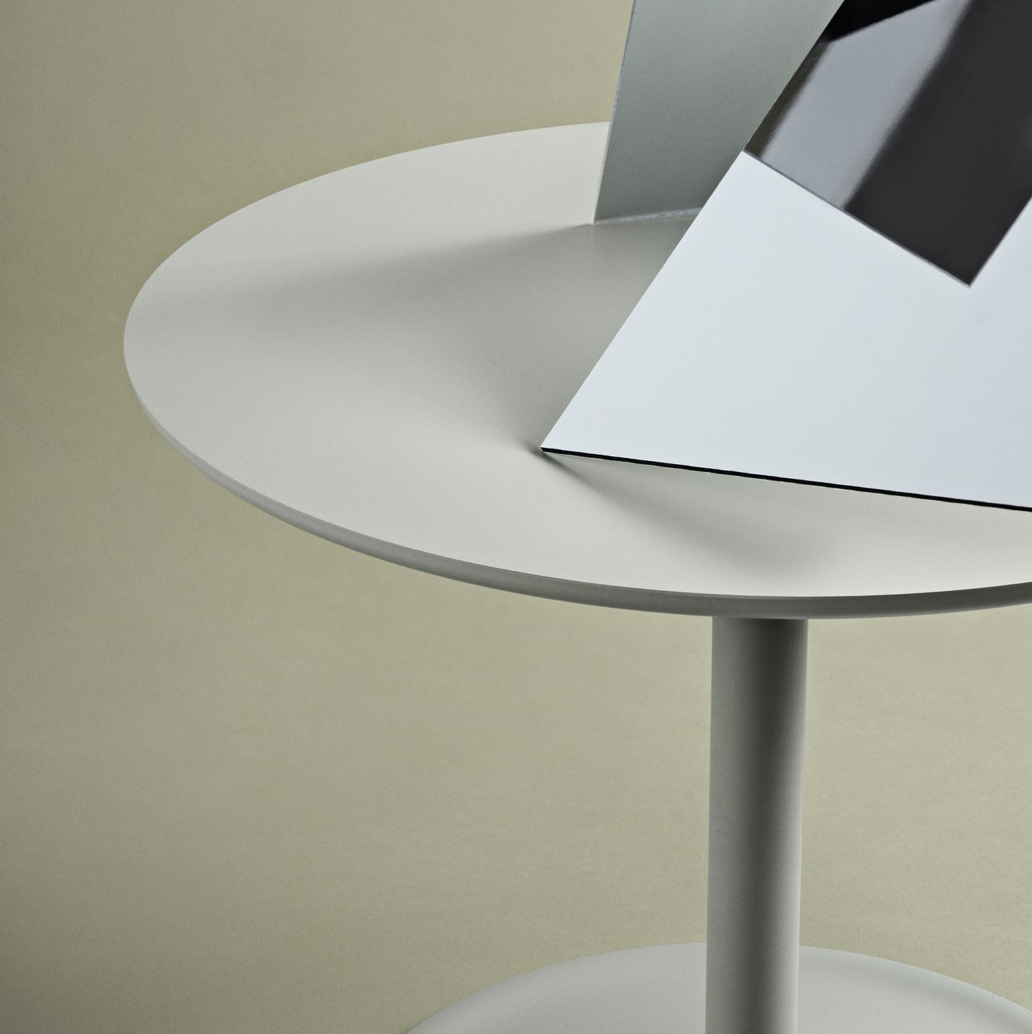 Soft Side Table Dusty Green Muuto Soft Side Table in dusty green shown in a minimalist setting, highlighting its clean lines.